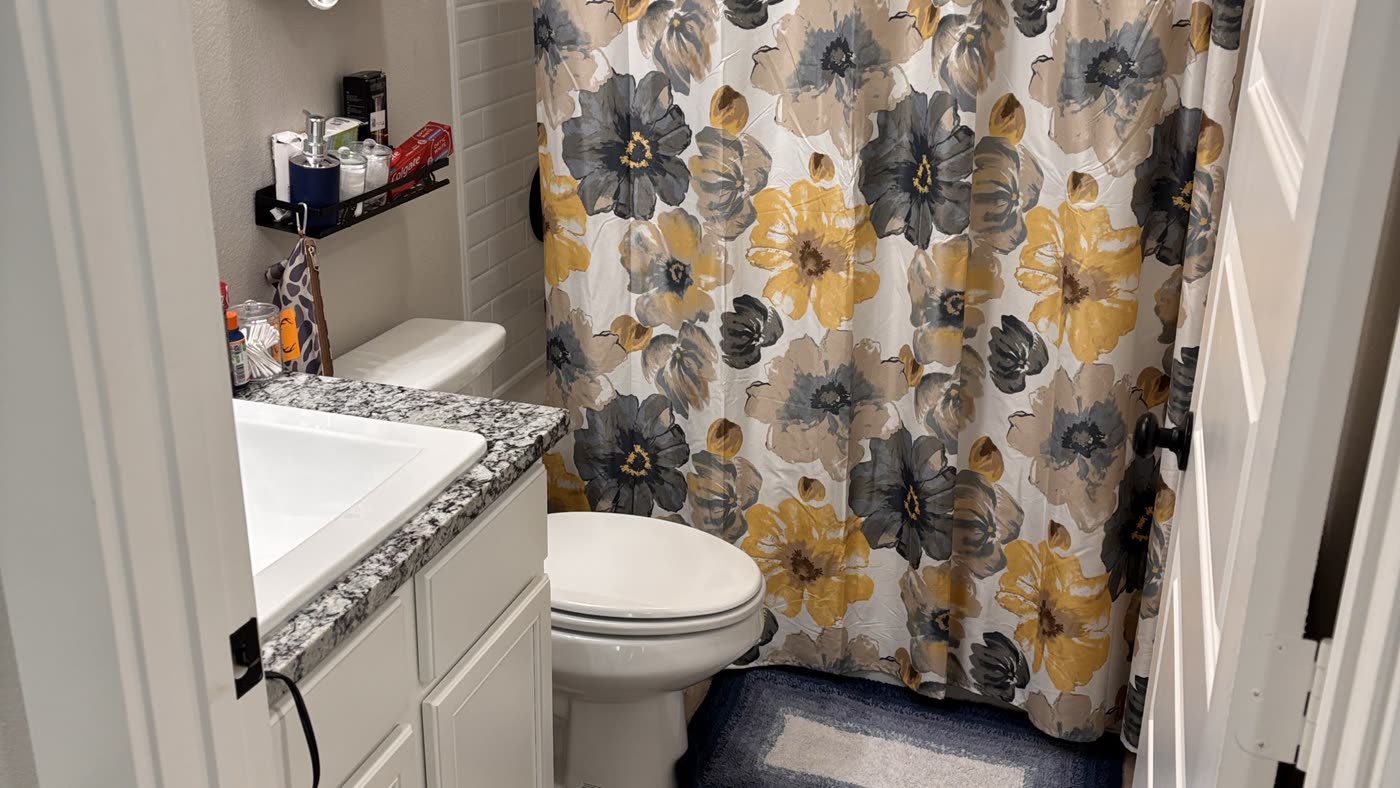 Clean bathroom with polished vanity and fixtures